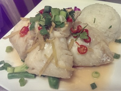 Rock Ling fillet steamed with lemon, fresh ginger, soy sauce  and served with creamy coconut rice.